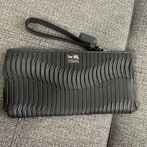 Coach black wristlet with blue interior